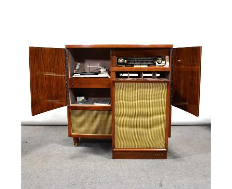 Bush radiogram, type SRG86, in a walnut veneered case, width 97cm, depth 43cm, height 96cm, with speaker.Qty: 2