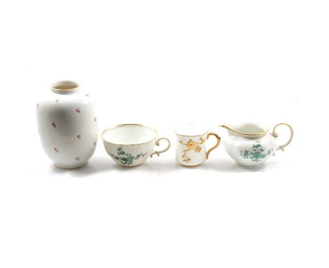 Viennese porcelain part-service, including two breakfast cups and saucers, milk, jug, sugar bowl, dishes, cake plate; other V