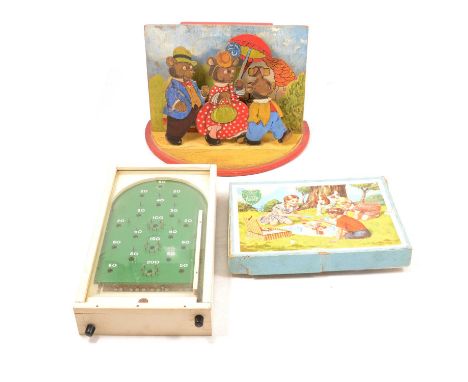 Quantity of children's games and puzzles, etc, including box puzzles, bagatelle, jigsaws, money boxes, childs chair, etc.