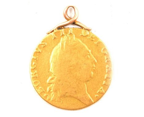 George III gold guinea, 1792, soldered ring suspension, gross weight 8.5g.