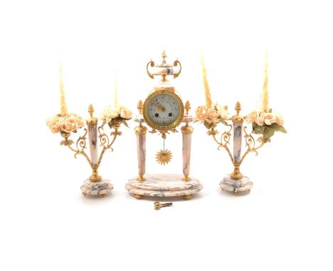 French garniture, variegated marble and gilt metal, including a clock of portico form with an urn finial, oval base, enamelle