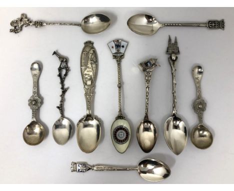 Assorted silver coloured metal and other travel/commemorative spoons, some with enamel decoration10 ozt 