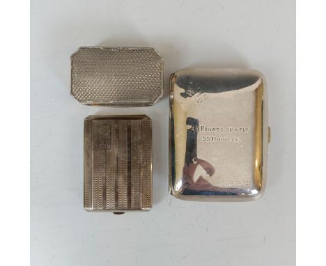 A silver pill box, with engine turned decoration, Birmingham 1911, a silver cigarette case, inscribed, and a silver matchbox 