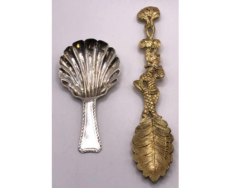 A William IV silver gilt naturalistic spoon, with a harlequin handle, London 1836, and a silver caddy spoon (2) 
