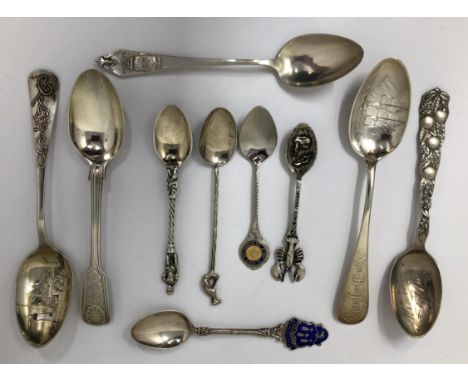 Assorted silver coloured metal and other travel/commemorative spoons, some with enamel decoration10 ozt 