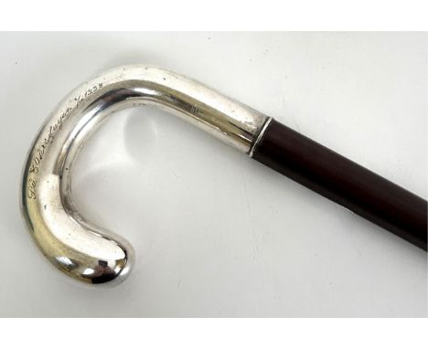 A walking stick, with a silver coloured metal handle engraved 'Gustav Gustavason', 89 cm 