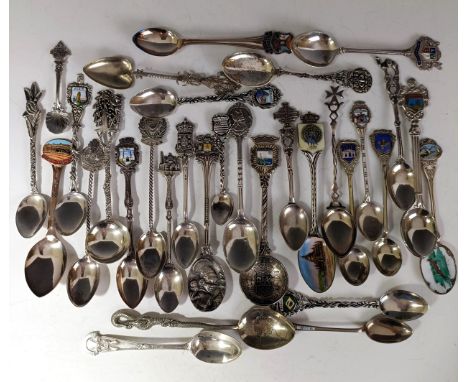 Assorted silver coloured metal and other travel/commemorative spoons, some with enamel decoration12 ozt 
