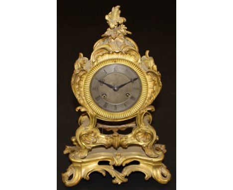 A 19th Century gilt brass cased mantel clock in the Rococo style of Louis XV, the eight day movement by Honore Pons, No'd. "4