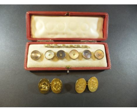 A pair of 18 carat gold cufflinks depicting Fitzgerald crest and initialled "CMF", together with a cased set of mother of pea
