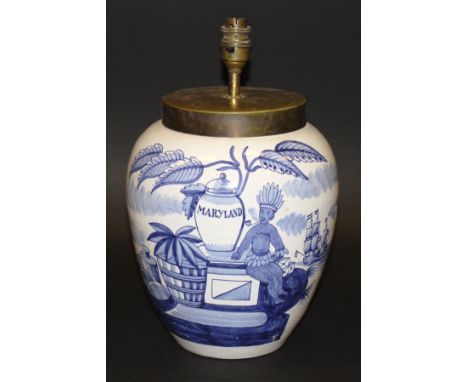 A circa 1800 De Lampetkan Dutch Delft tobacco jar, depicting a native American smoking a pipe and sitting beside a tobacco ja