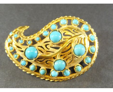 An 18 carat gold and turquoise bead leaf shaped brooch, approx 8 g CONDITION REPORTS Approx 3.75cm long.  Overall some light 