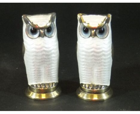 A pair of David Andersen novelty peppers in the form of owls with white and black enamelled decoration, stamped "D.A Norway S