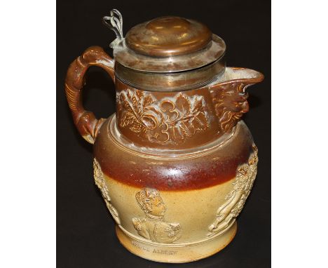 A 19th Century stoneware hot water jug marked "Prince Albert" and "Queen Victoria", with electro-plated lid, mask head spout 