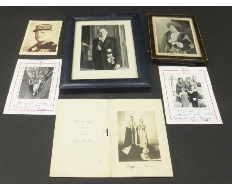 A framed and glazed black and white photograph of Queen Elizabeth (later the Queen Mother) signed "Elizabeth R" and dated Jan