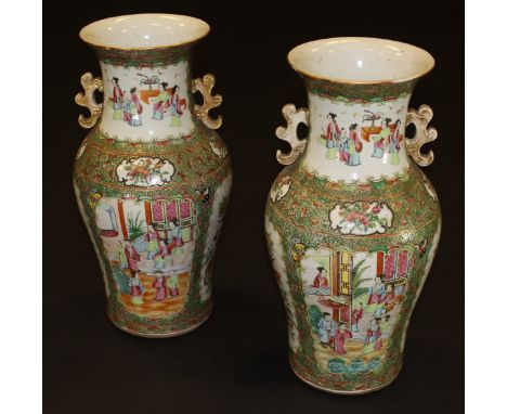 A pair of large 19th Century Chinese porcelain baluster shaped vases decorated in the famille-rose palette with cartouches an