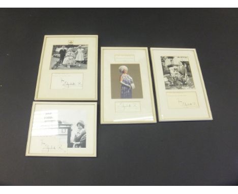 A framed and glazed black and white image of the Queen Mother with three Royal grandchildren and corgi adapted from the 1960 