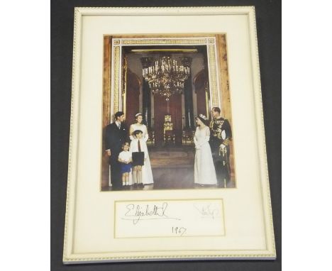 A framed and glazed image of the Royal Family in formal dress adapted from the 1967 Christmas card signed (probably autopen) 
