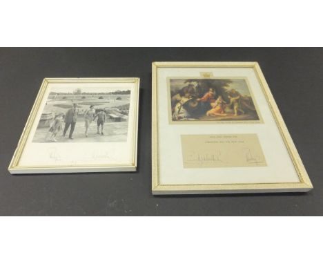 A framed and glazed black and white photographic portrait of Her Majesty The Queen and Prince Philip with Prince Charles and 