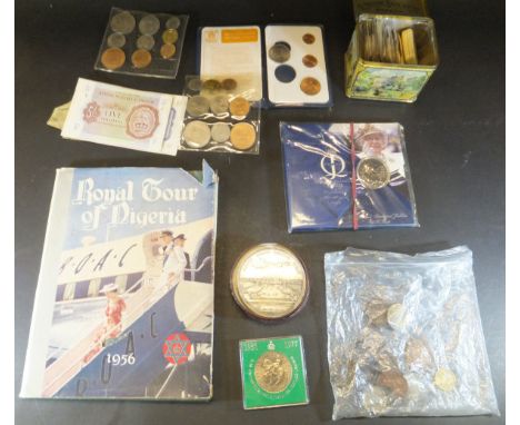 A box containing various World coinage and commemorative coins and tokens including 1766 calendar coin, 1852 Bank of Upper Ca