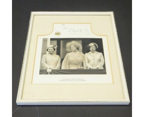 A framed and glazed image of Queen Mother with Her Majesty The Queen and Princess Margaret at Buckingham Palace following the