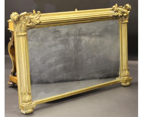 A William IV gilt framed overmantel mirror, the rectangular plate within a reeded and column decorated frame with foliate dec