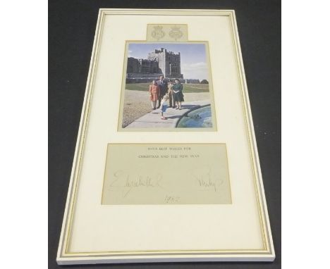 A framed and glazed image of the Royal Family beside a water feature in the grounds of Windsor Castle adapted from the 1962 C