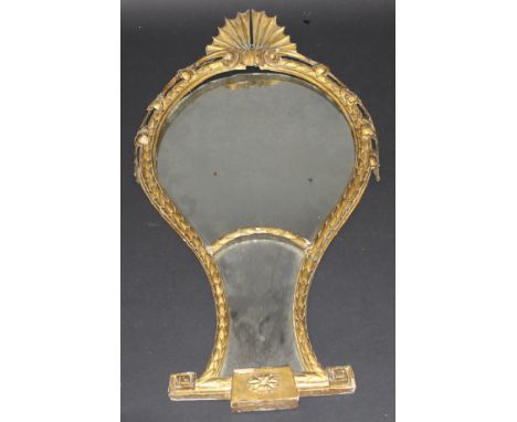 A 19th Century carved giltwood and gesso framed wall mirror with shell surmount over an inverted teardrop shaped twin plate w
