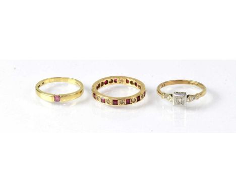 Four 9ct gold rings, one set with moss agate style stone, size R, an eternity ring set with white and red stones, size P, one