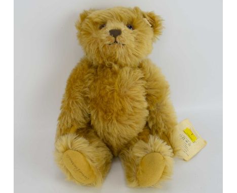 STEIFF; Disney 2000 mohair cinnamon teddy bear EAN No.651748, with jointed limbs, certificate of authenticity and tag in ear,