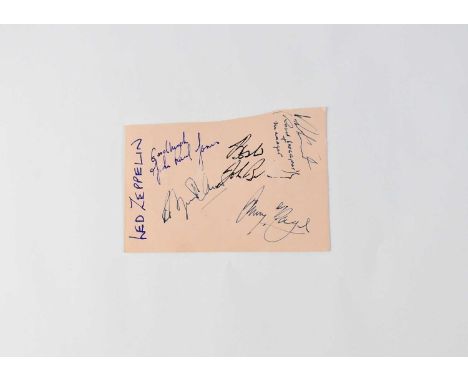 LED ZEPPELIN; a torn page from an autograph book bearing signatures for members of the band to include, Jimmy Page, John Paul