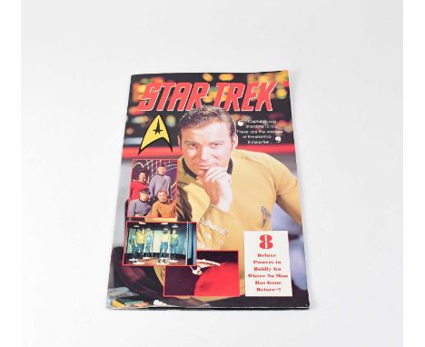 STAR TREK; a large format poster book of eight images, signed to inner pages by William Shatner, Nichelle Nichols, DeForest K