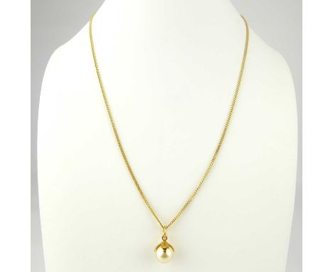 A simulated pearl pendant on yellow metal mount, suspended on 18ct gold dainty chain with ring clasp, length 42cm, approx. 5g