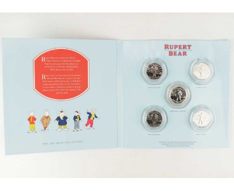 A 'Rupert Bear: The 50p Coin Collection' featuring five encapsulated coins, comprising 'Rupert bear', 'Podgy Pig', 'Edward Tr