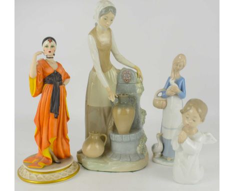 Four collectible porcelain figures, comprising a Spanish high glaze figure of a lady with amphora by a well, height 30cm, a L