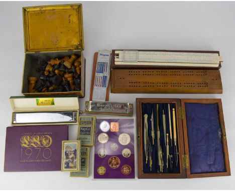 Mixed collectibles to include two harmonicas, 'The Bandmaster De Luxe Chromatic', a boxed Hero harmonica, three boxed sets of