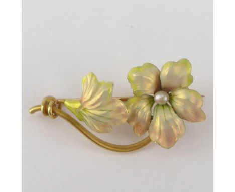 A gold and enamelled floral brooch of naturalistic design, with seed pearl to the centre of the flower head, length 3.2cm, un