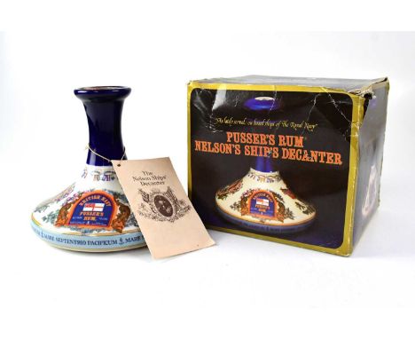 RUM; a boxed British Navy Pusser's Rum, Nelson's ship's decanter (af).Condition Report: - The box is worn, most notably to th