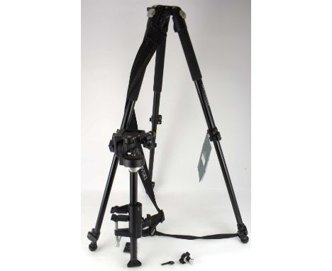 SWAROVSKI OPTIK; a professional tripod and head assembly for spotting scope and cameras, with instruction booklet.