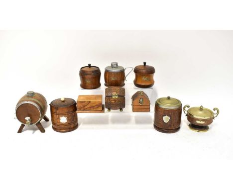 A small collection of treen items, including lidded biscuit barrels, a coopered barrel on stand decanter, tea caddies, etc.