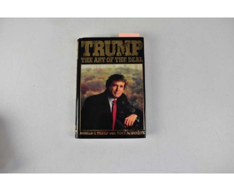 DONALD TRUMP; 'The Art of the Deal', signed and dedicated to inner page, 'To John Best Wishes Donald Trump'.Condition Report: