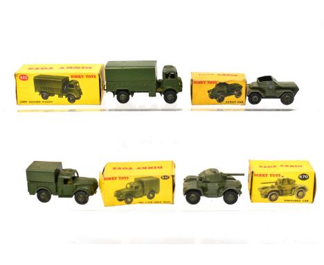 DINKY; four boxed military vehicles, comprising '623 Army Covered Wagon', '670 Armoured Car', '673 Scout Car' and '641 Army 1