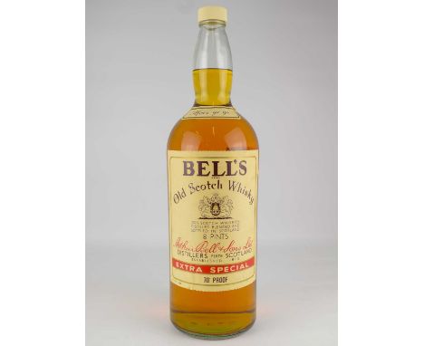 WHISKY; a large eight-pint bottle of Bell's Extra Special 70% proof Old Scotch Whisky, height of bottle 50cm.