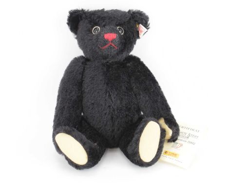 STEIFF; a no.671111 Black Museum 2002 limited edition bear, no.1838, with tags and button in ear, black, length 28cm.