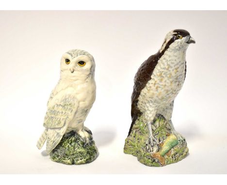 ROYAL DOULTON; a figure of a snowy owl as a Whyte &amp; Mackay decanter, modelled by John G Tong 1984, and a Beswick example 