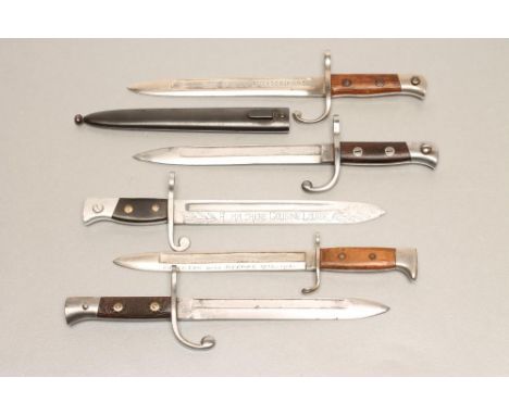 FIVE WWI BELGIAN MINIATURE SOUVENIR BAYONETS, comprising a Liege Gunmaking school apprentice piece with carved grip, a prison