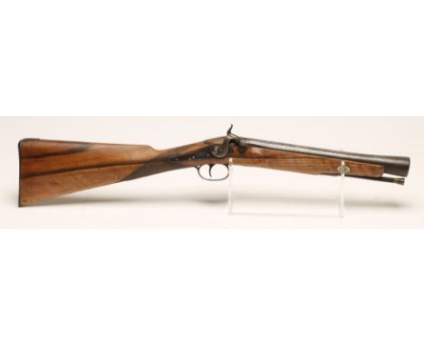 A PERCUSSION BLUNDERBUSS, with 12 1/2" steel barrel, rear groove sight to the tang, action converted from flintlock with scro