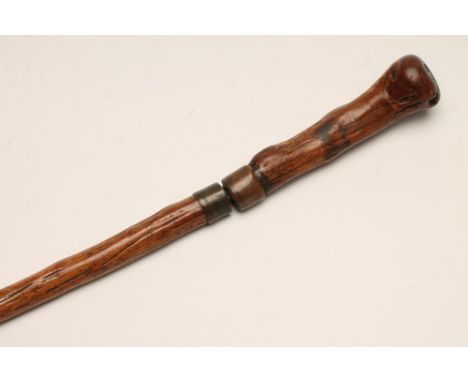 A SWORD STICK, early 19th century, with 26" fullered blade in raw stick construction, 34 1/2" long (Est. plus 21% premium inc