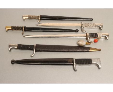 SIX GERMAN MINIATURE M. 98 BAYONETS, 1918-39, two with D. Peres maker's mark, three with metal scabbards, one with a leather 