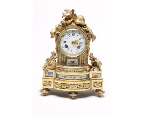 A FRENCH ORMOLU AND PORCELAIN CASED MANTEL CLOCK, the two train movement with outside count wheel striking on a bell, back pl