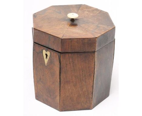 A GEORGIAN MAHOGANY AND ROSEWOOD TEA CADDY, late 18th century, of octagonal form, the hinged lid with turned ivory finial, op